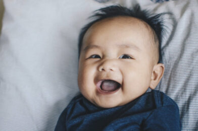 When do babies start to smile?